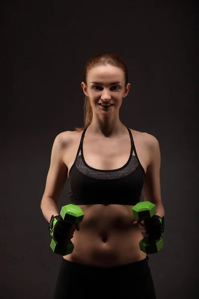 Athletic young woman doing a fitness workout with weights. Fitness girl — Stock Photo, Image