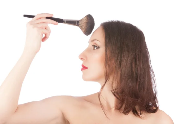 Belle femme blonde avant et après le maquillage avec une brosse de maquillage sur blanc — Photo