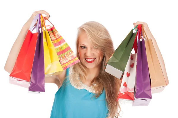 Joven bonita mujer de pie con coloridas bolsas de compras — Foto de Stock