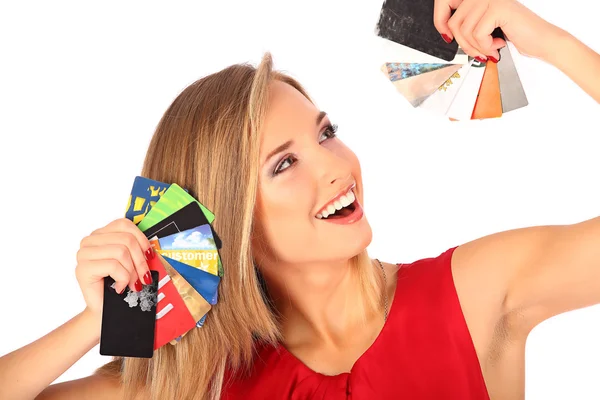 Aantrekkelijke blonde met creditcard in de hand — Stockfoto