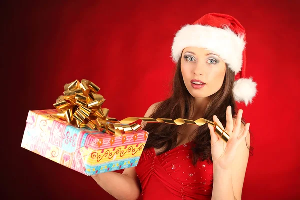 Portrait of beautiful sexy girl wearing santa claus clothes — Stock Photo, Image