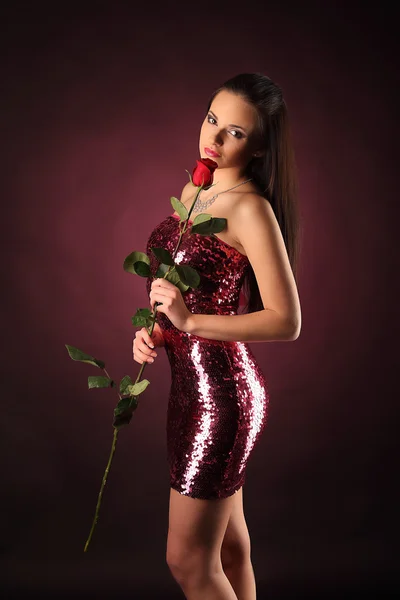 Valentines beautyfull girl with red rose in her hands — Stock Photo, Image