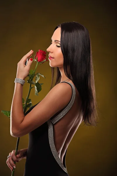 Valentines beautyfull girl with red rose in her hands — Stock Photo, Image