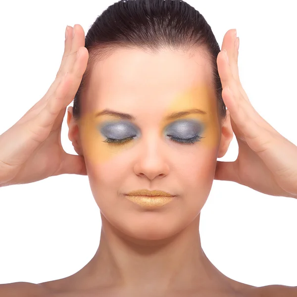 Mooie jonge vrouw met blauwe creatieve make-up — Stockfoto
