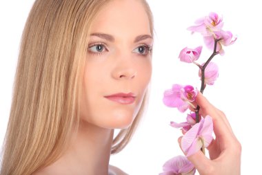 Güzel Spa kız ile orkide çiçek cilt bakım kavramı