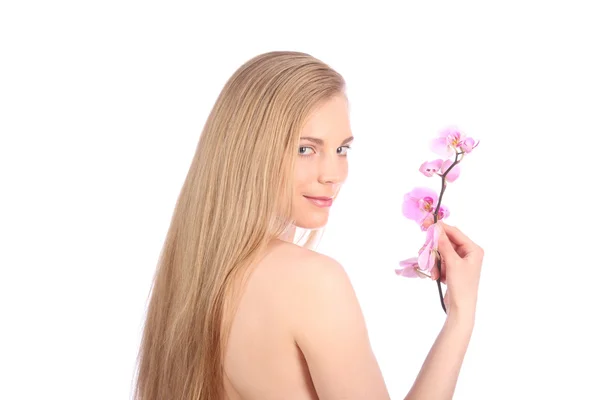 Bella ragazza della stazione termale con il concetto della cura della pelle dei fiori del Orchid — Foto Stock