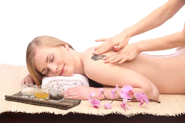 Young woman getting a massage in spa — Stock Photo, Image