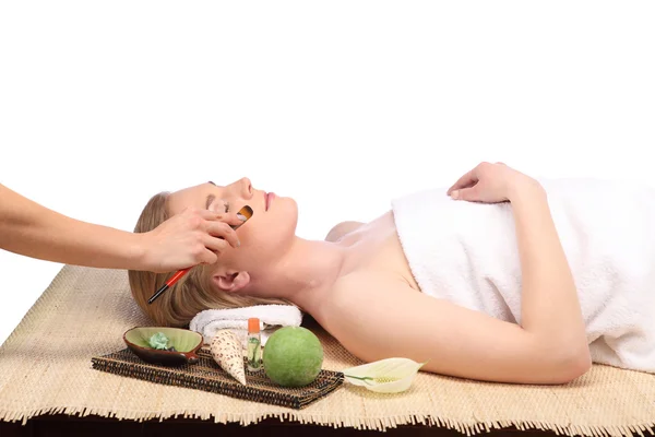 Young beautiful woman receiving facial massage and spa treatment — Stock Photo, Image