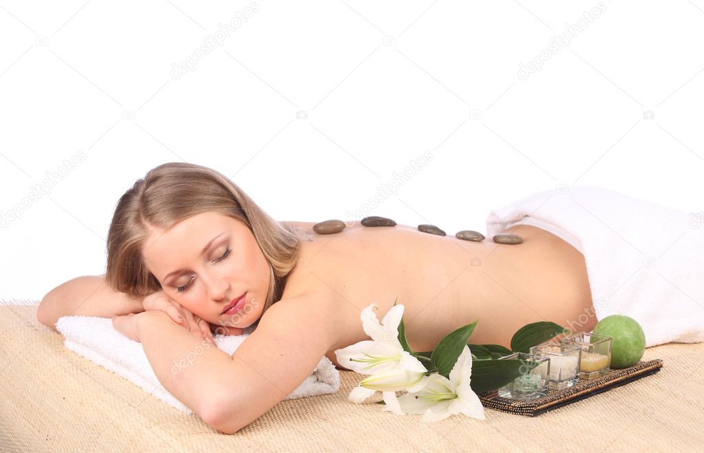 Young woman getting a massage in spa