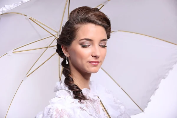 Portrait of young woman with umbrella retro wedding — ストック写真