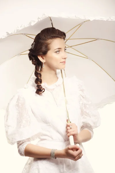 Portrait of young woman with umbrella retro wedding — ストック写真