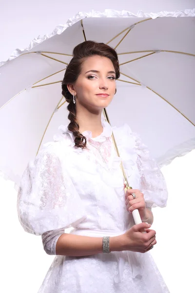 Portrait of young woman with umbrella retro wedding — Stock fotografie