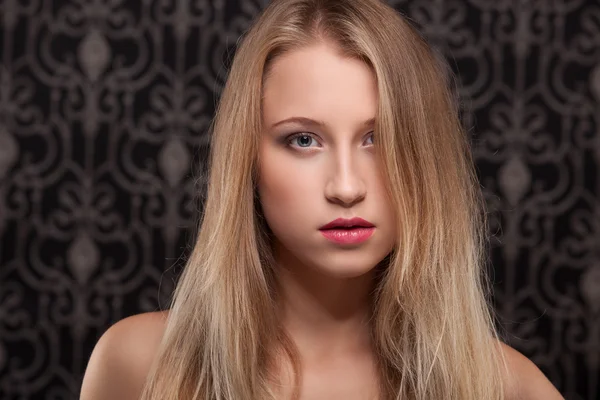 Studio portrait of smiling beauty in lingerie — Stock Photo, Image