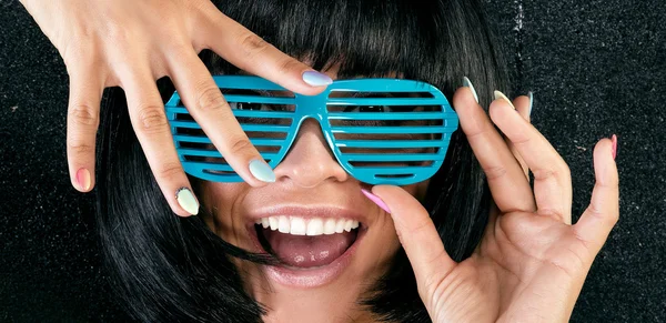 Happy smiling girl in blue glasses. — Stock Photo, Image