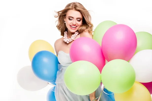 Посміхаючись красива дівчина з повітряними кулями . — стокове фото