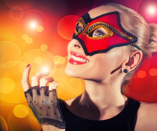 Woman in carnival mask smiling. Stock Image