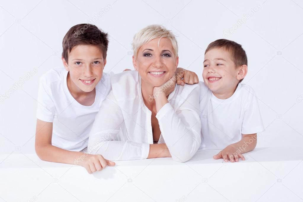 Family portrait, mother with sons.
