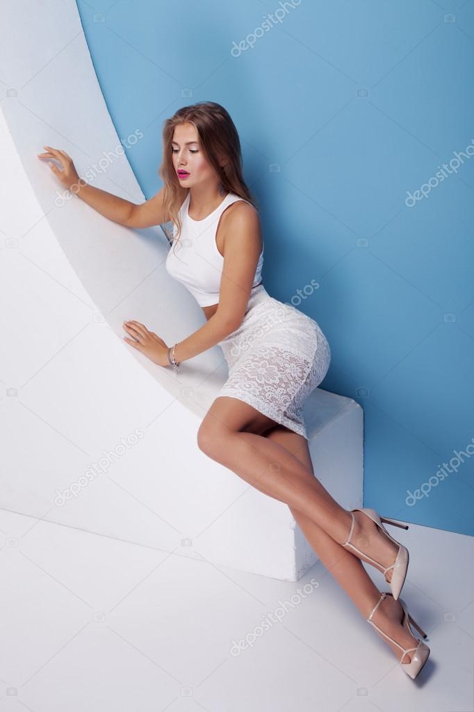 Fashionable sexy woman posing in studio.
