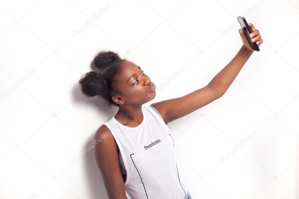 Teenage girl with mobile phone.