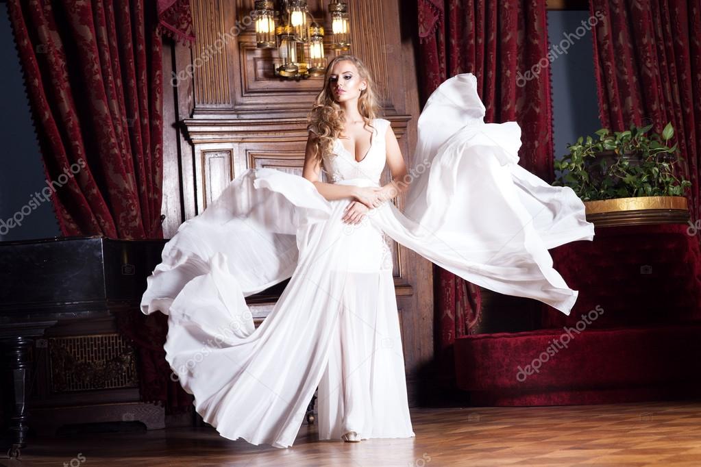 Beautiful bride in white dress.
