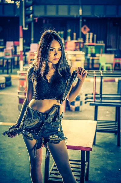 Asia Sexy lady in black shirt and short jeans — Stock Photo, Image