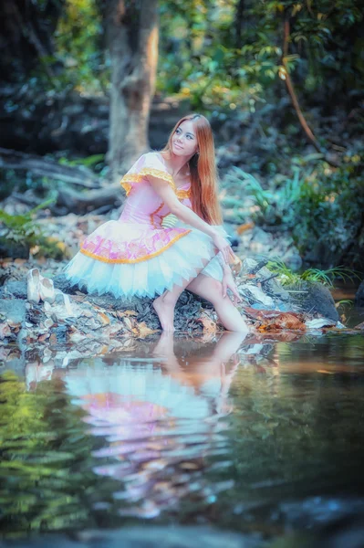 asia beautiful girl in ballet dress on nature