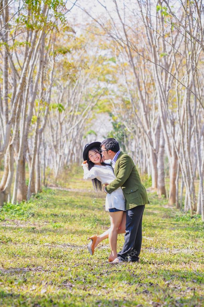 Uncut asian couple outdoor