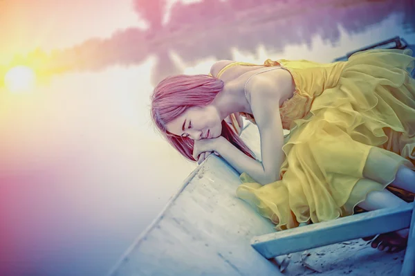 Asia Beautiful woman in yellow dress sit on boat — Stock Photo, Image