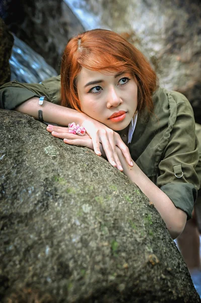 Asia Beautiful young girl stand at water fall — Stock Photo, Image