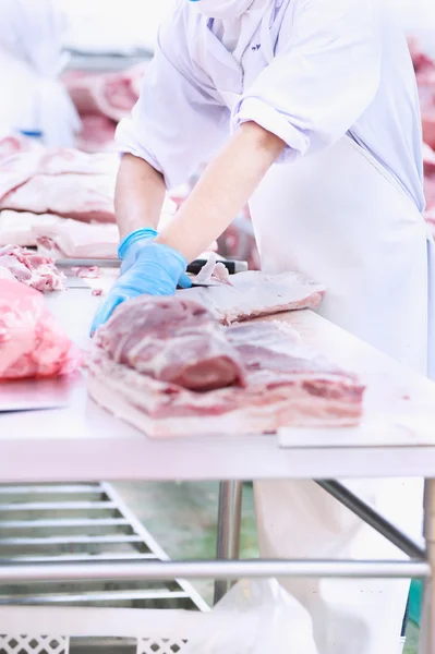 butcher that cuts fresh pork