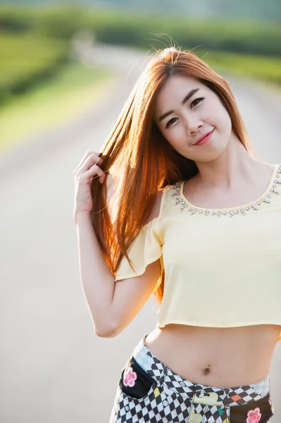 Portrait smile Thai Beautiful girl in sun on the road — Stock Photo, Image