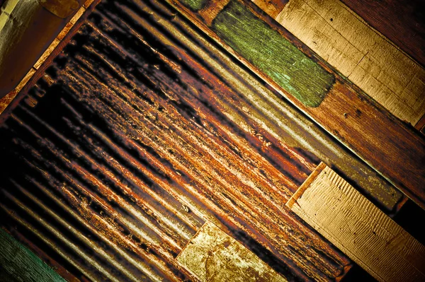 Rusty metal and colour wood for background — Stock Photo, Image