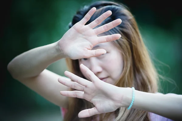 Asian women showing stop hand gesture,  focus hand — Stock Photo, Image