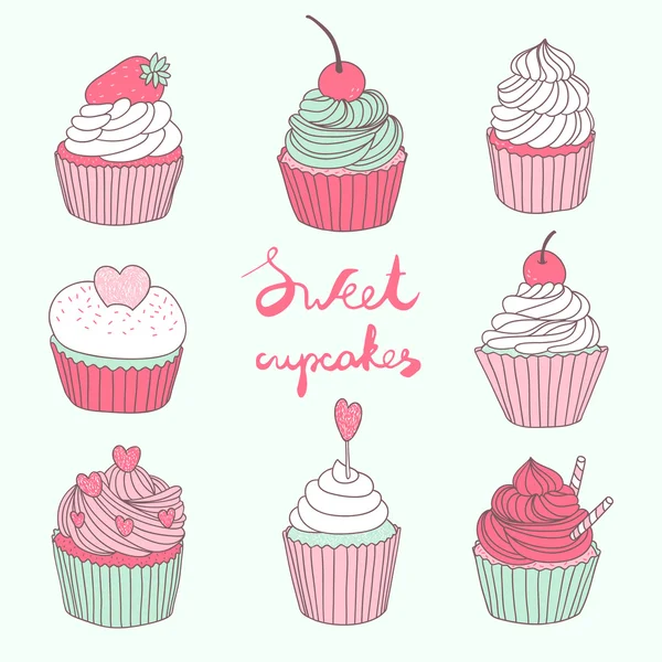 el ile şirin cupcakes ayarla vektör çekilmiş