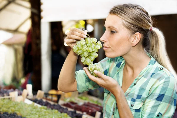 Young Woman at the Green Market. Stock Image