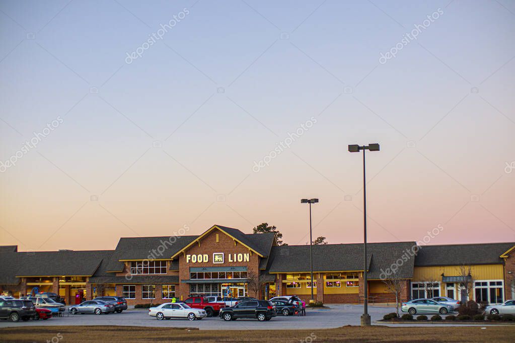 Columbia County, Ga USA - 12 22 20: Food Lion grocery retail supermarket with cars