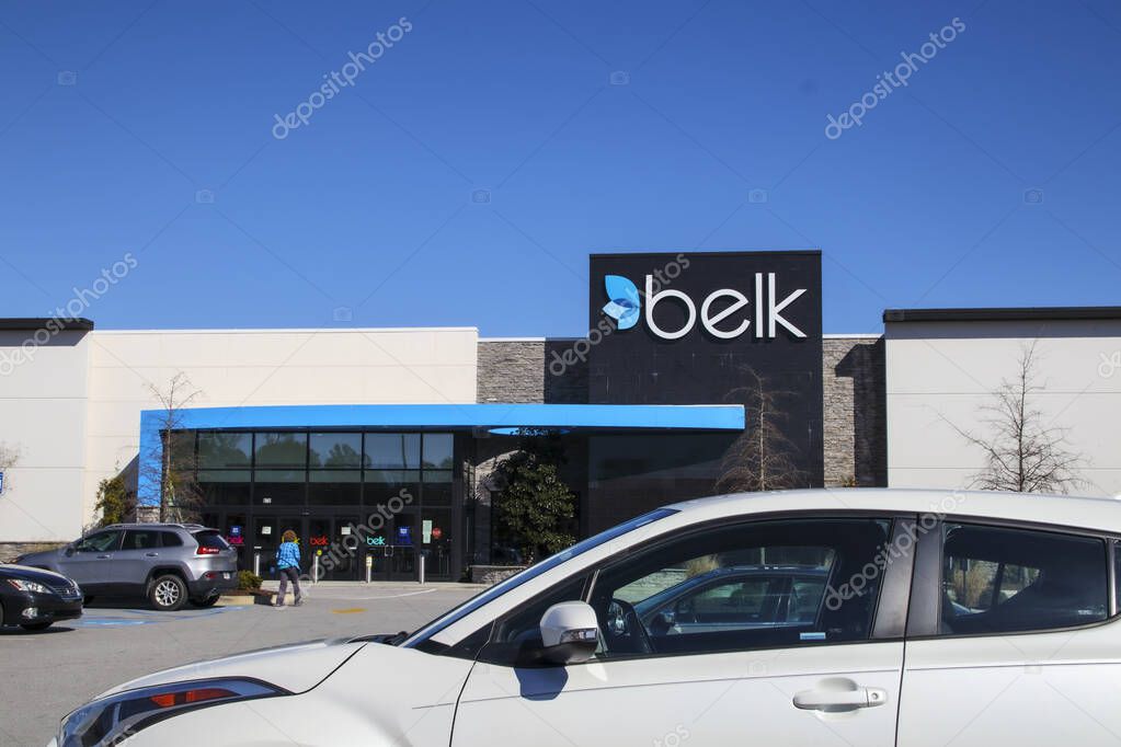 Augusta, Ga USA - 01 28 21: Belk retail store people and cars with blue sky