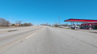 Augusta, Ga USA - 02 21 21: POV FPV driving on an urban industrial highway bridge and ponds - Gordon Highway