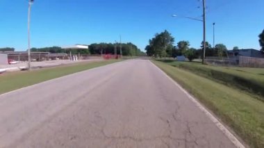 POV FPV driving on a country road electrical company and school bus passing
