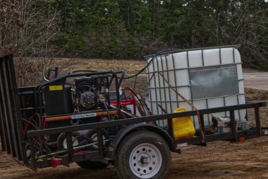 Augusta, Ga USA - 03 06: 21: Basınçlı çamaşır makinesi, kiralık su tankı ve karavan 