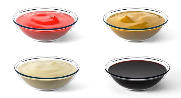 Çeşitli soslar. Küçük porsiyonlar. Beyaz izole