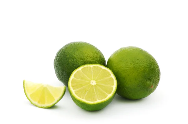 Limes with slices — Stock Photo, Image