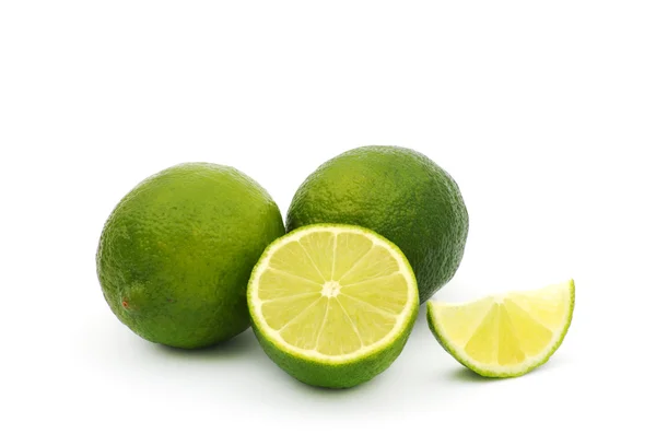 Limes with slices — Stock Photo, Image