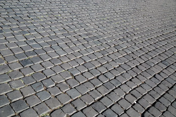 Texture of old cobblestone. City street. — Stock Photo, Image