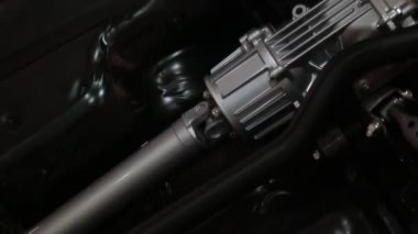 Ayrıntı kardan iletim. Hareketin kapatın. Çalışıyor. Eylem motor parçaları. Sahne gösteren ayrıntılı hareketinin.