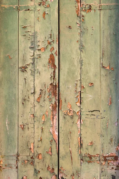 Texture of wooden boards. Paint is weathered. Green and red colors — Stock Photo, Image
