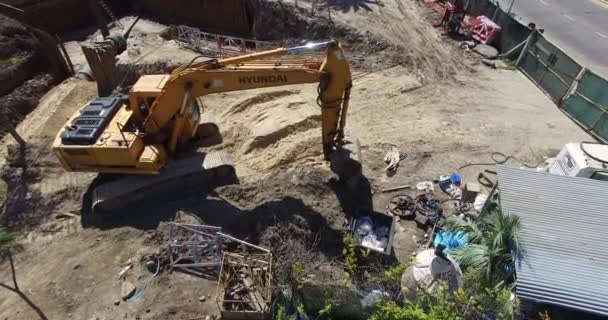 Aerial view of construction machinery. Yellow caterpilar. — Stock Video