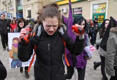 March of Women's Solidarity Against Violence in Kharkiv, Ukraine. March 8, 2016 clipart