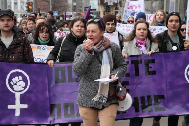 March of Women's Solidarity Against Violence in Kharkiv, Ukraine. March 8, 2016 clipart