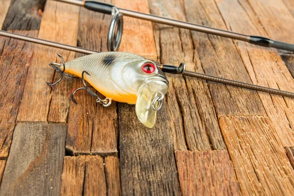 Rybářské návnady na dřevěné pozadí. — Stock fotografie